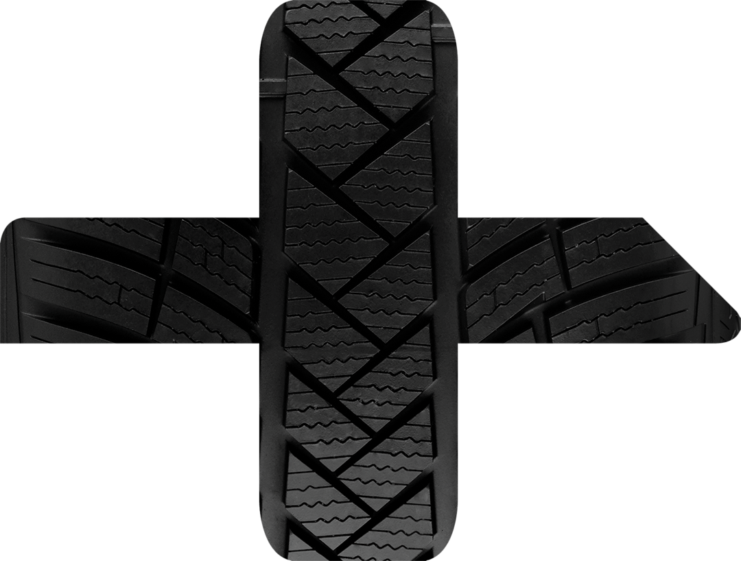 Nærbilde av et dekk med resirkuleringssymbolet.